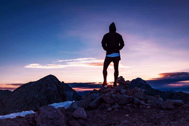 Man on a peak cliff